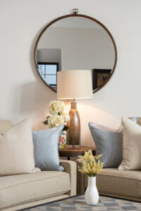 Living Room Sofas with Accent Mirror - Home Design by Dennis Miller Homes