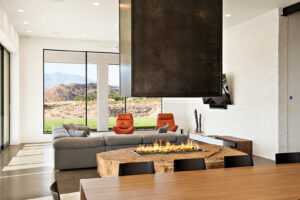 Luxury Living Room with Custom Indoor Fireplace and Dining Area - St. George Custom Home Design