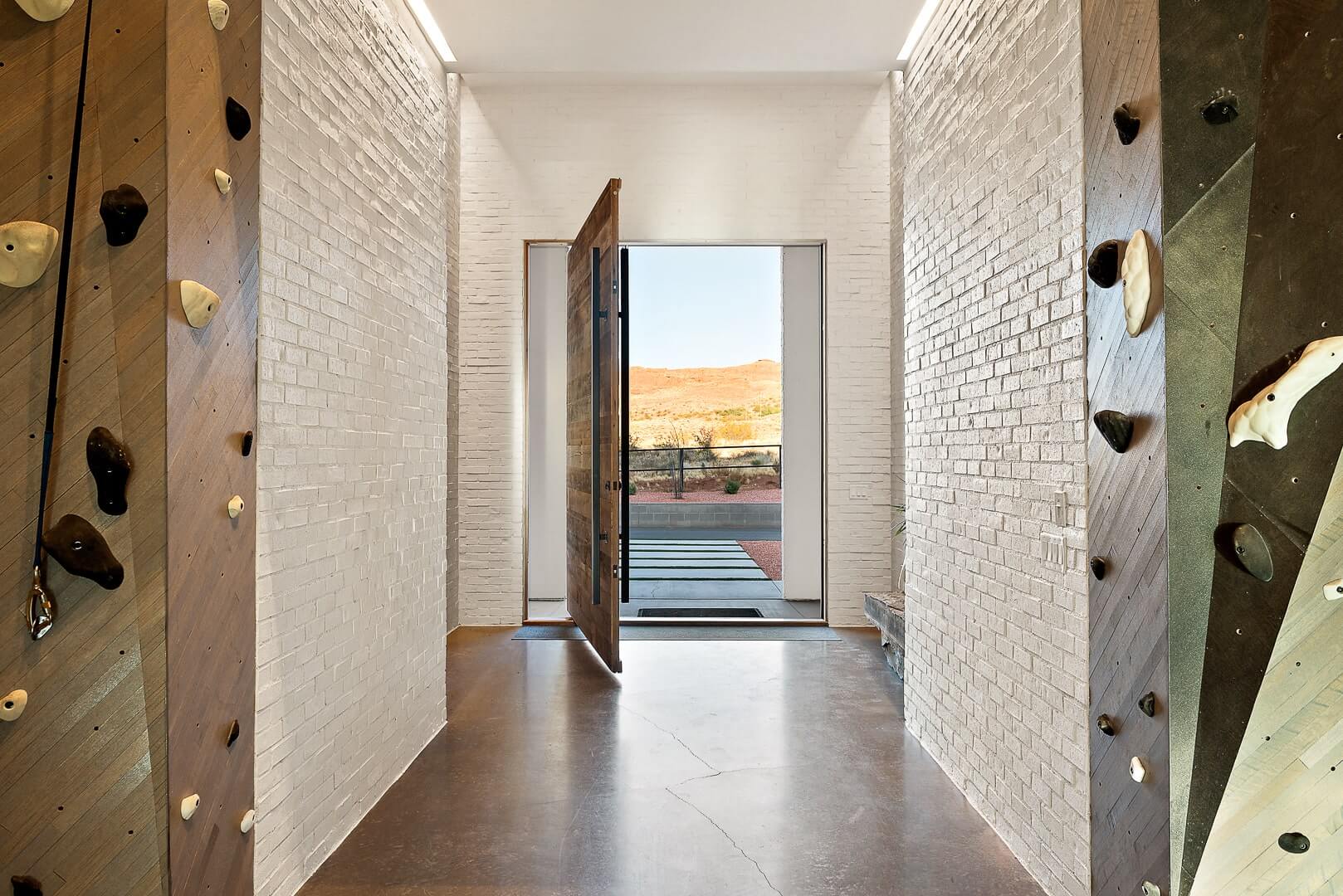 Inside view of pivot door in southern Utah custom home